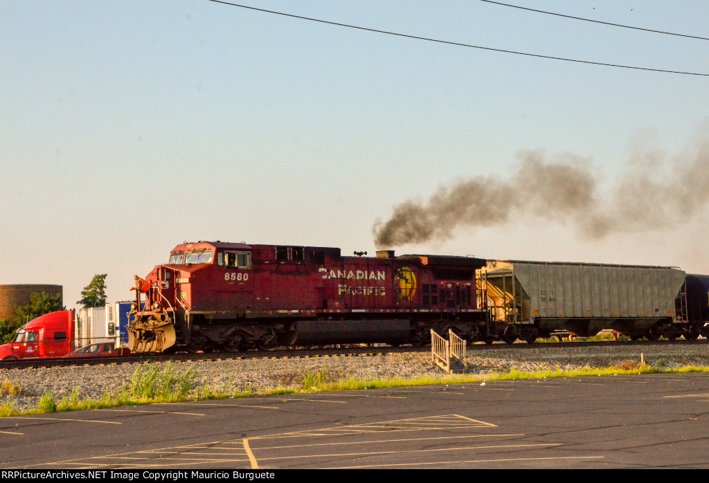 CP AC44CW Locomotive leading a train